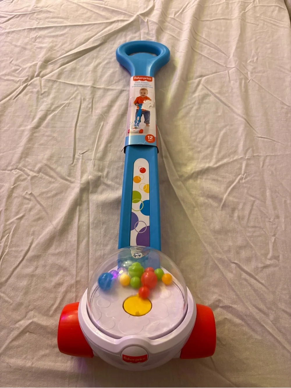 Fisher-Price Blue Corn Popper Push Walker with Red Wheels